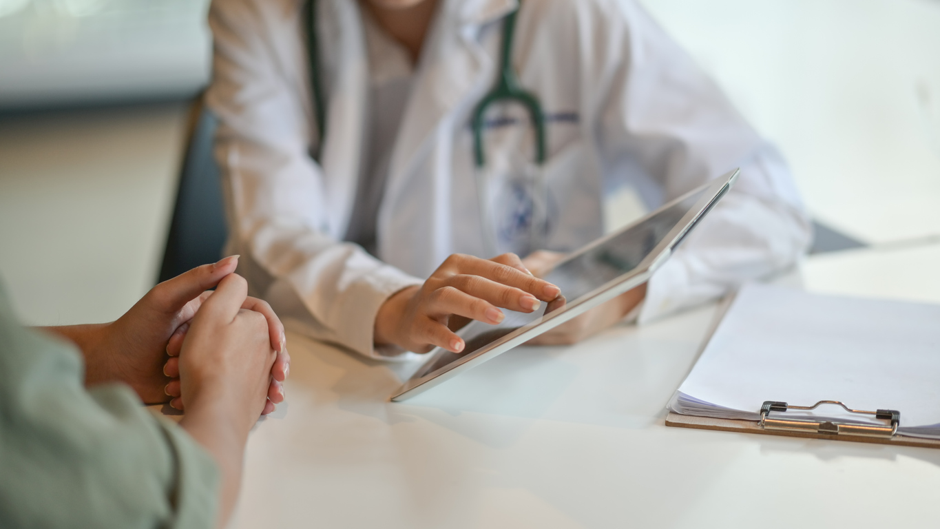 Healthcare worker informs patient